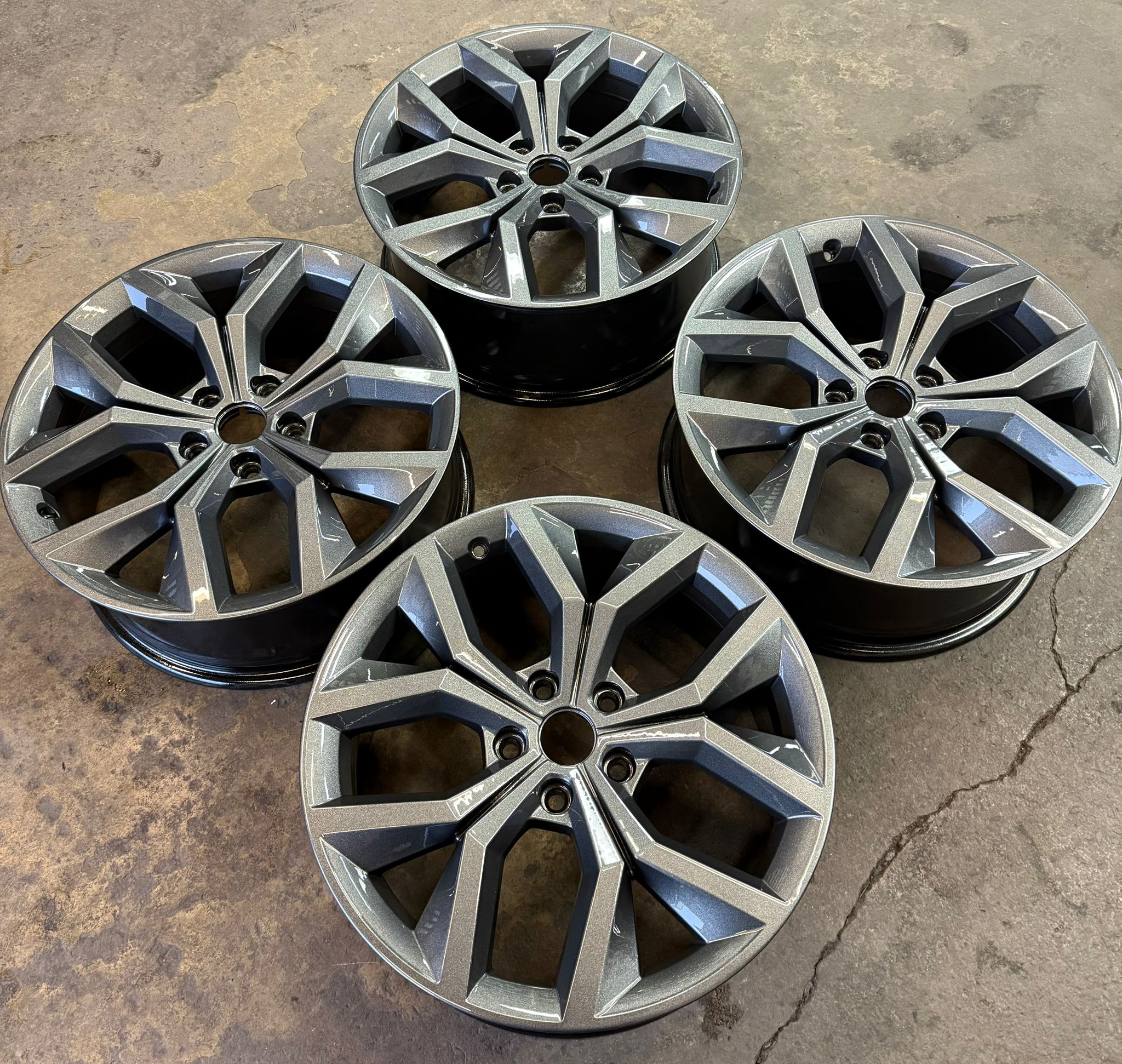 After — A full set of oxidised, weather-worn alloys stripped and powder-coated in a fresh anthracite. — Burnley
