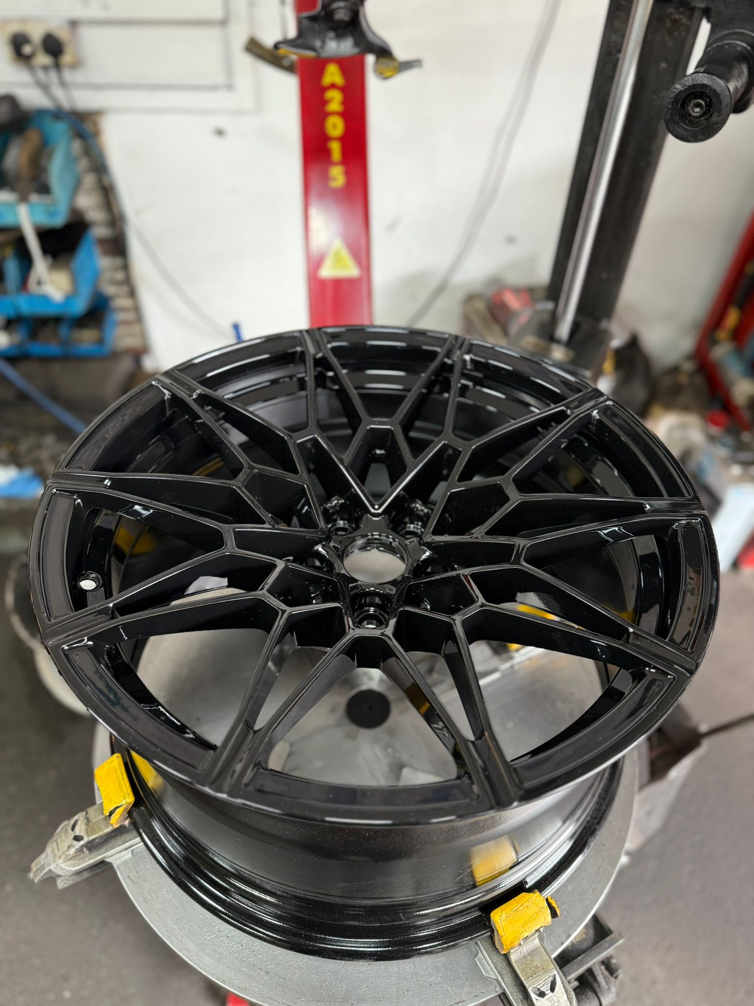 An alloy freshly refurbished in a deep gloss black powder coat
